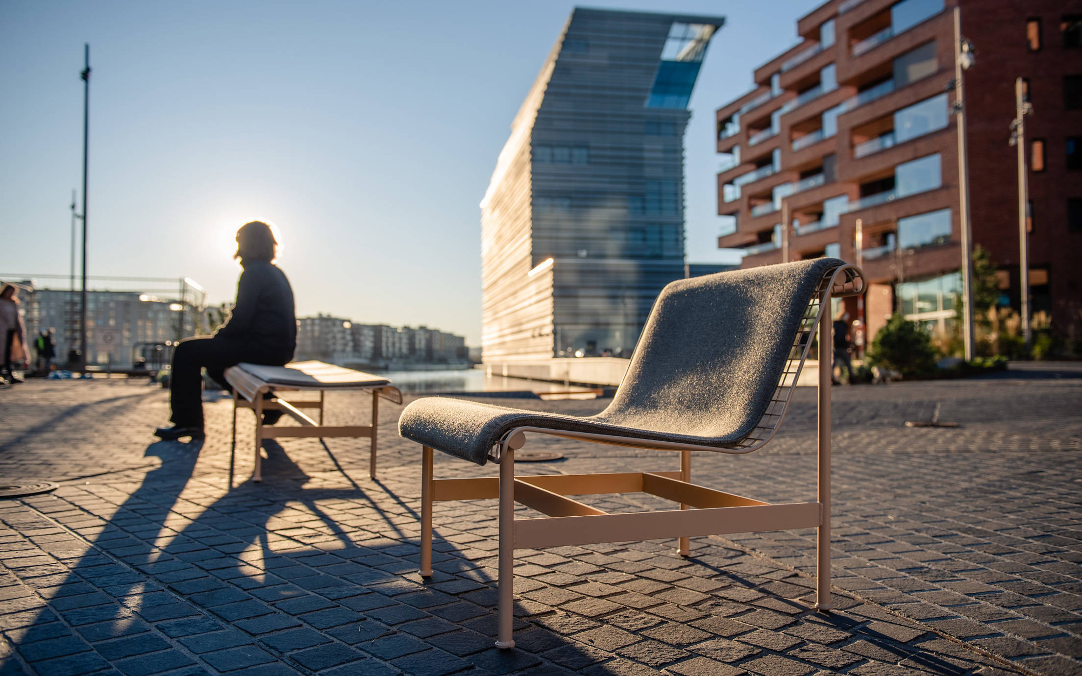 Outdoor chairs in patio area near Oslo's Munch museum