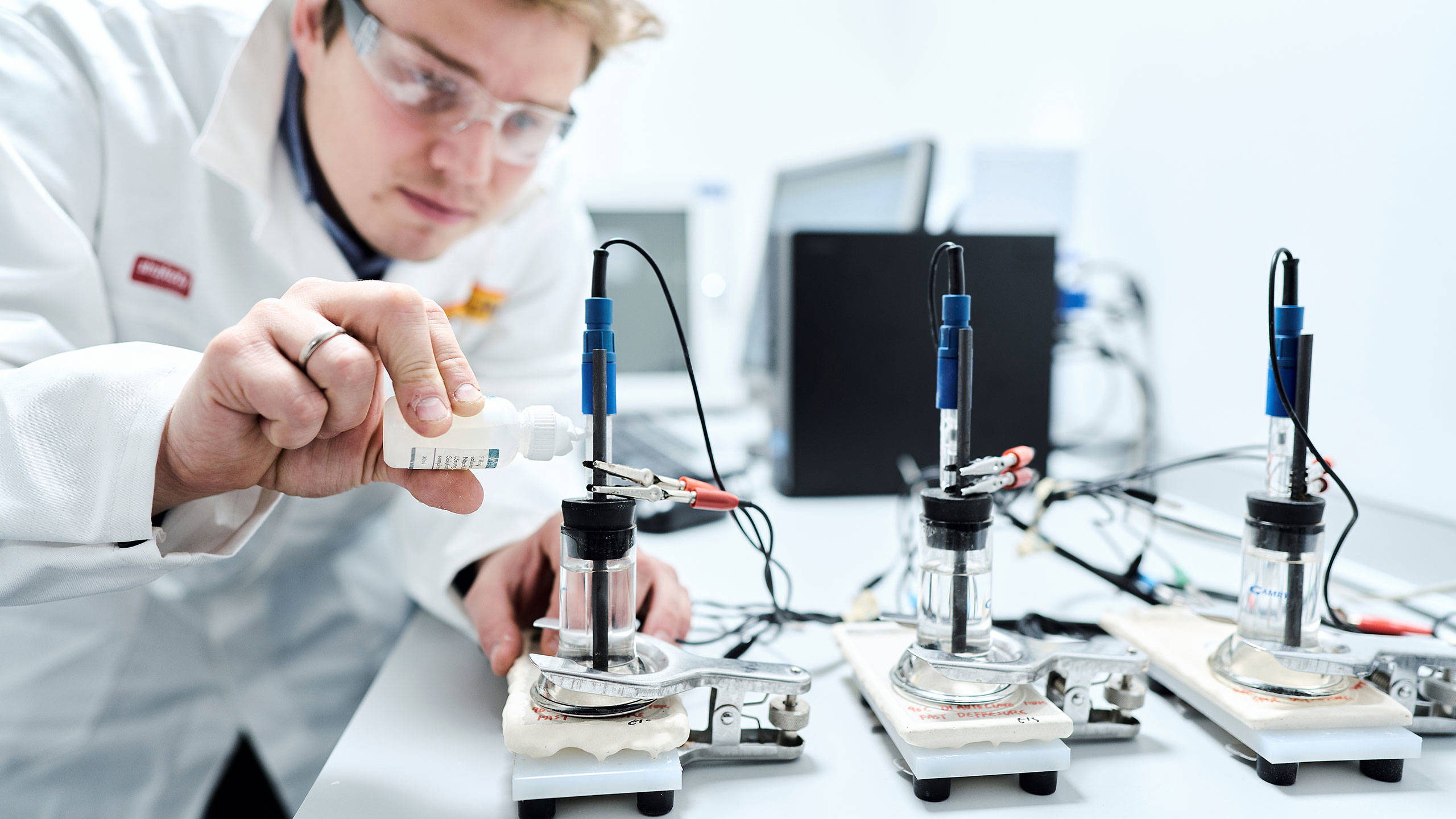 Scientist Andreas Løken at global paints and coatings company Jotun's main R&D Center in Sandefjord, Norway, performing electrochemical impedance spectroscopy (EIS) measurements in order to assess barrier properties of protective coatings. Photo: Jotun/Morten Rakke.