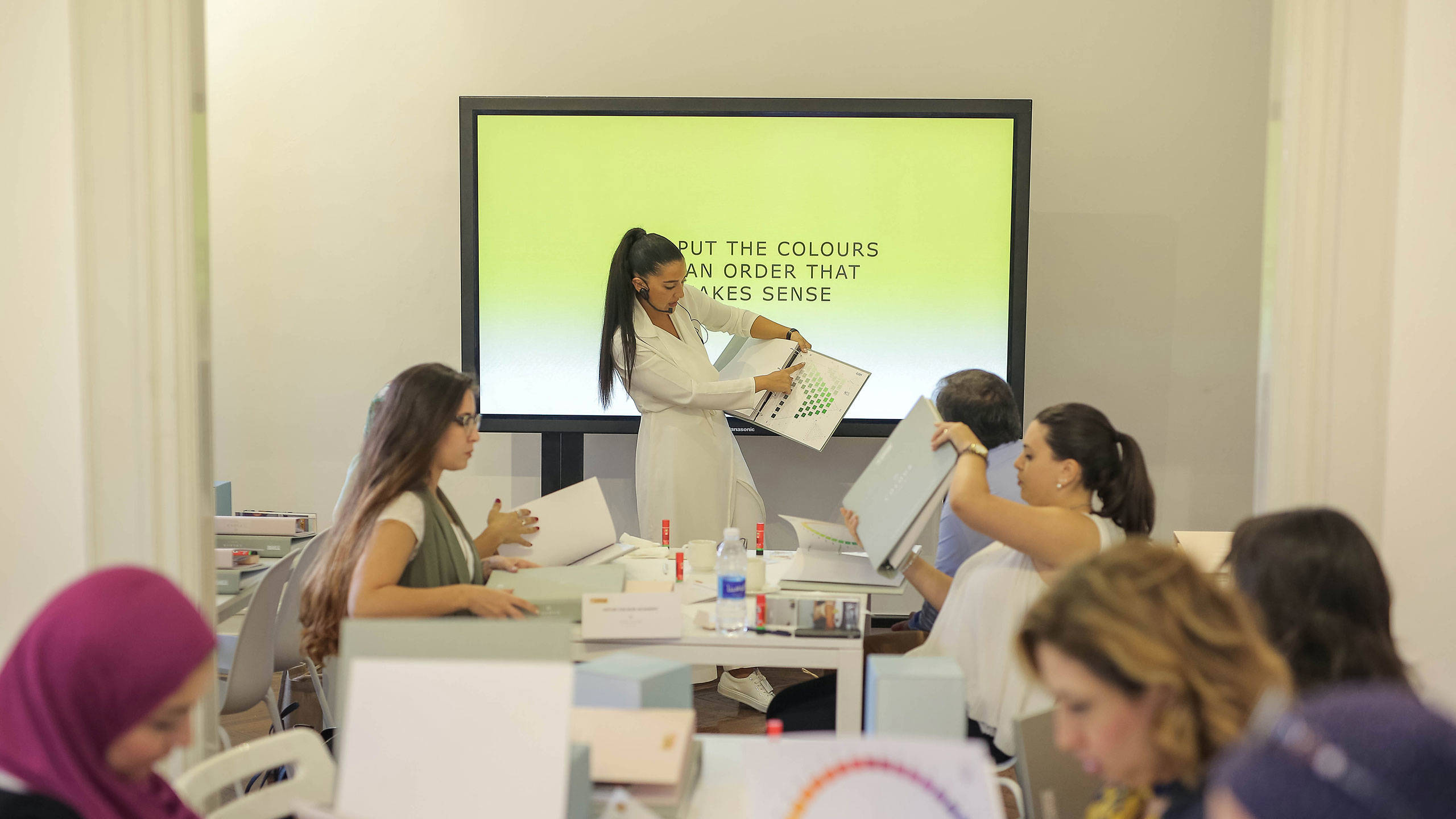 Regional Jotun Colour Marketing Manager Rana Khadra teaching a Jotun Colour academy class