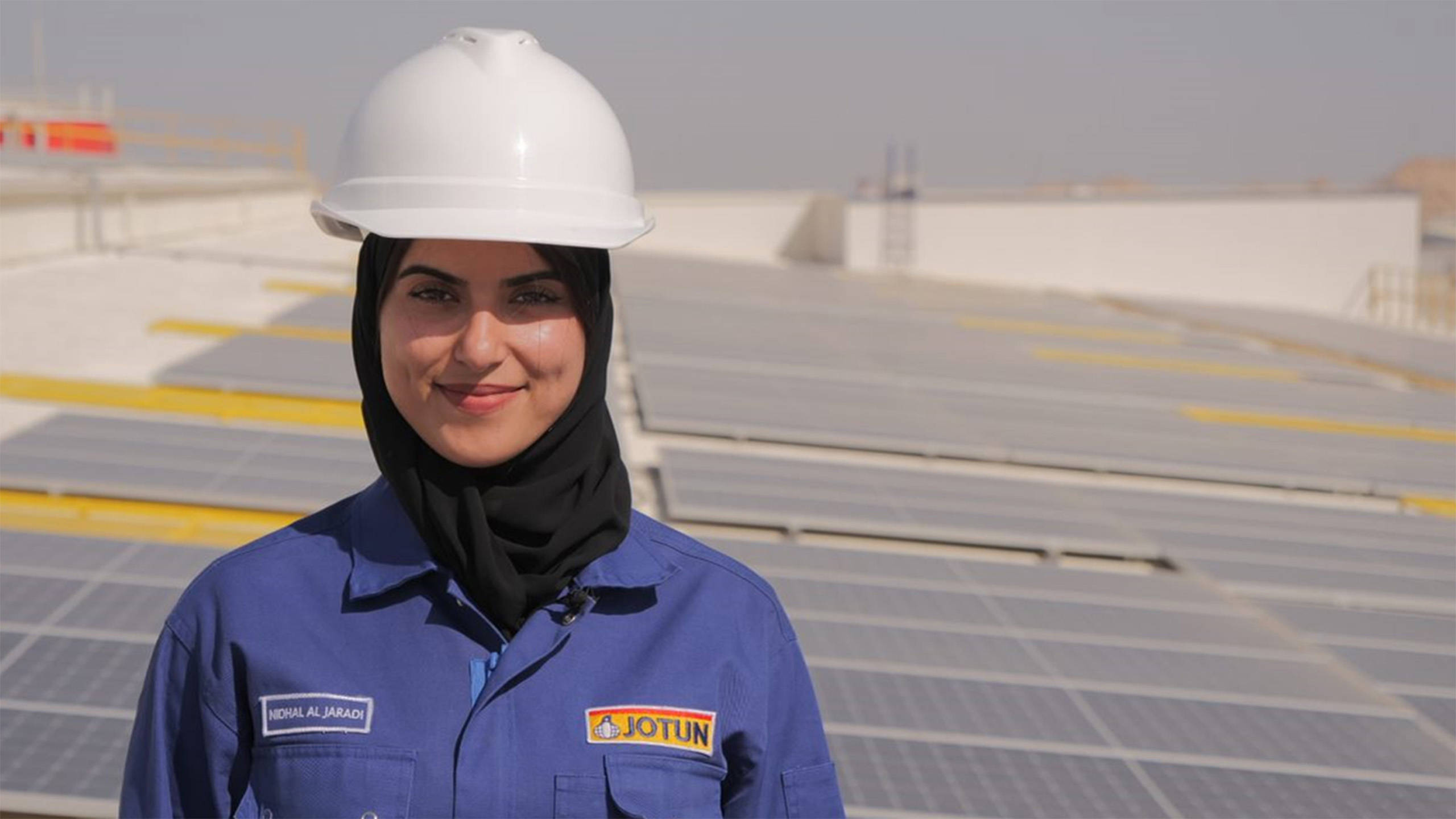 Woman on rooftop of the Jotun factory in Oman